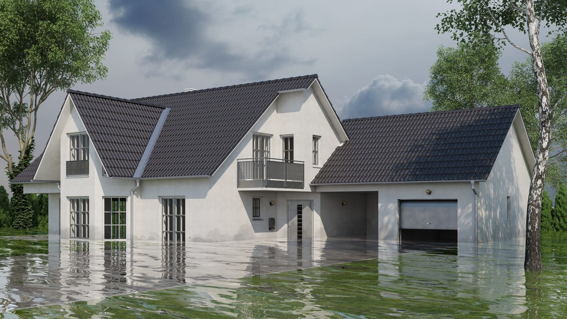 Haus unter Wasser | Gebäude mit Wasserschaden nach Hochwasser (© Robert Kneschke / stock.adobe.com)